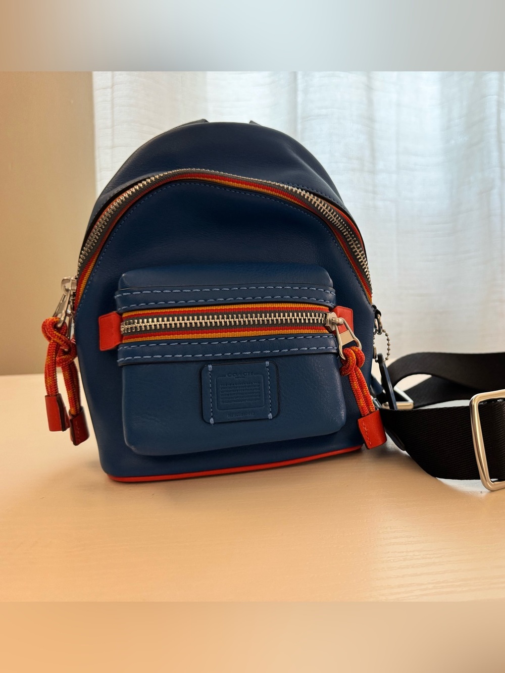 Coach West Leather Utility Sling Pack Blue Multi Stripe Orange